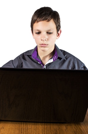  teenager surfing the net ,over white background. It is not isolatedの写真素材