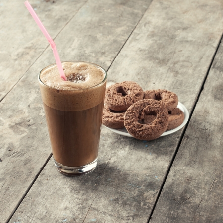 Greek coffee, cold Frappe drinkl and biscuits on tableの写真素材