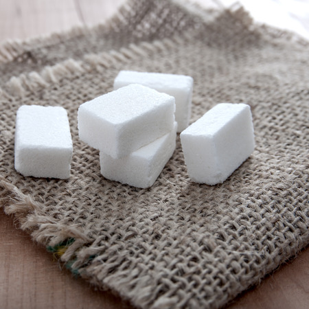 Close up photo of sugar cubes on tableの写真素材
