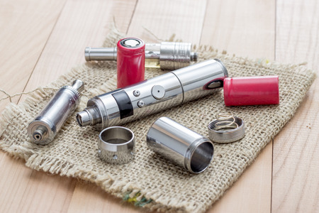 Advanced vaping device, E-cigarette on tableの写真素材