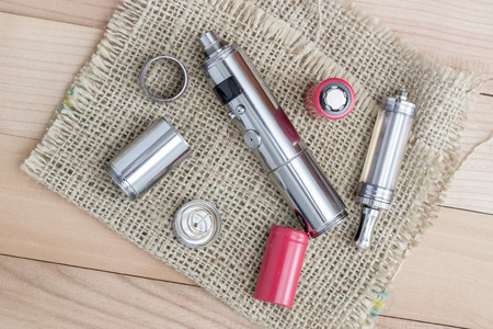 Advanced vaping device, E-cigarette on tableの写真素材