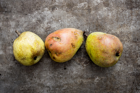 Top view of organic Pears on a rustic backgroundの写真素材