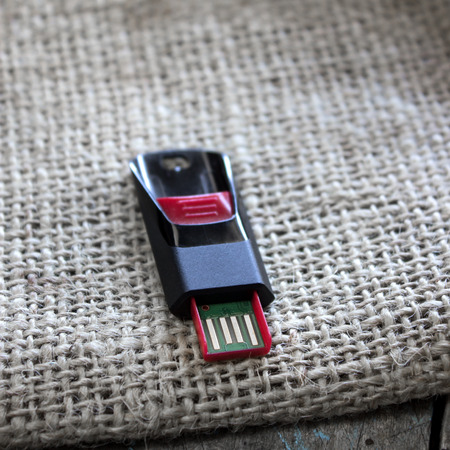 USB flash drive on the table, close up photo