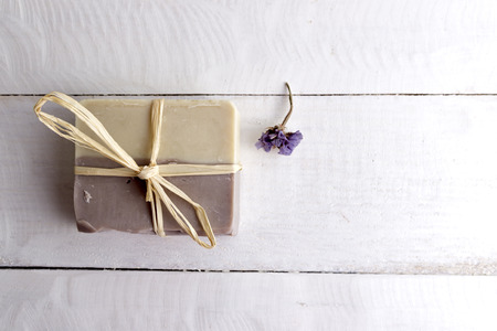 Natural handmade soap over wooden background
