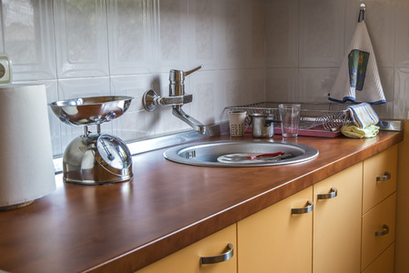 Close up photo of orange kitchen interiorの写真素材