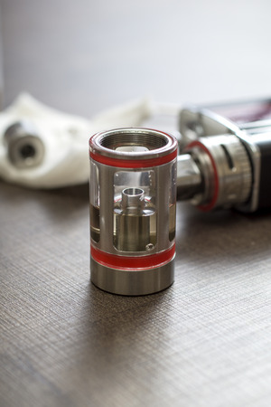 Electronic cigarette Atomizer on the table,  close upの写真素材