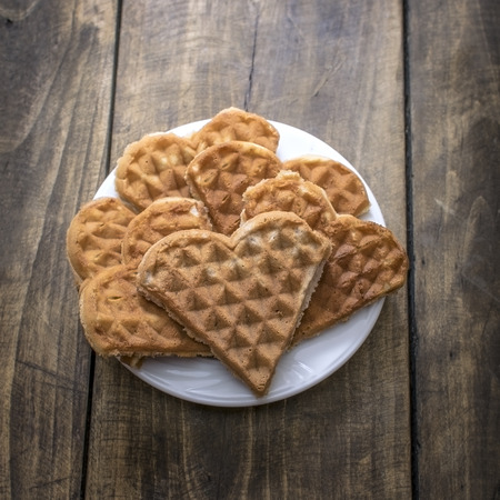 Heart shaped waffles on the plate, from aboveの写真素材