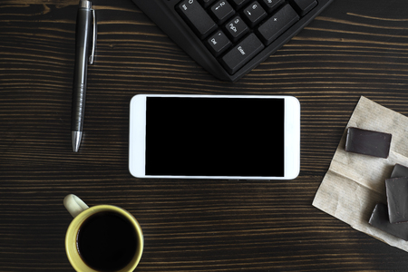 Working office desk in dark colorsの写真素材