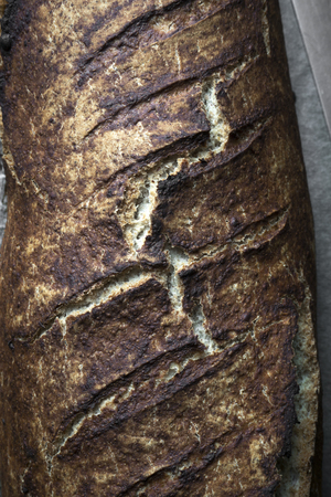 Freshly baked homemade  bread on table, top viewの写真素材