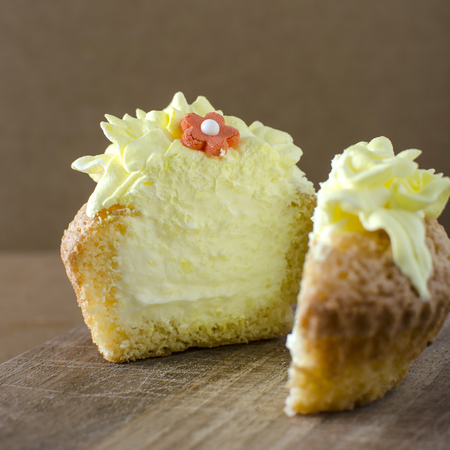 Cupcake stuffed with cream, close upの写真素材
