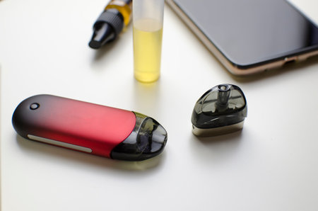Vape pod system or pod mod with changeable cartridges , close up