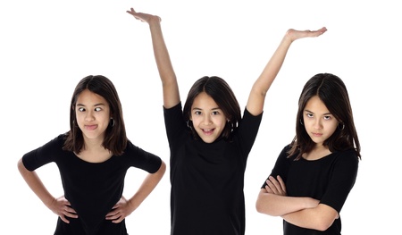 A young girl expresses various expressions of her personalityの写真素材