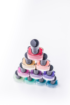 rainbow of nail polish isolated on a white backgroundの写真素材