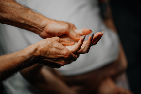 an image of a woman's hands doing a relaxing massageの写真素材