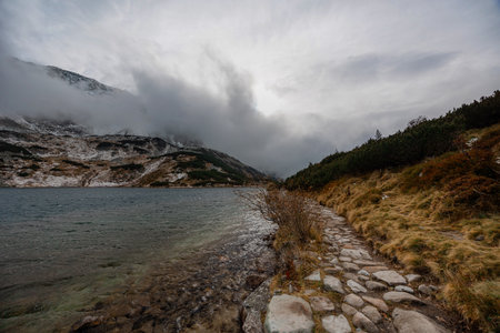 Beautiful mountain landscape with dramatic cloudy skyの写真素材