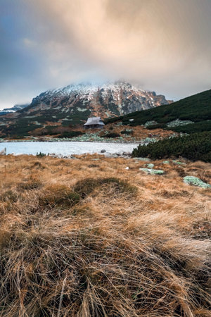 Beautiful mountain landscape with dramatic cloudy skyの写真素材
