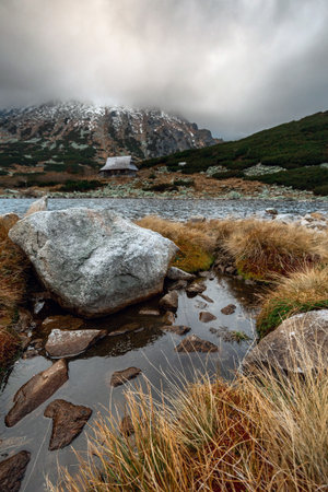 Beautiful mountain landscape with dramatic cloudy skyの写真素材