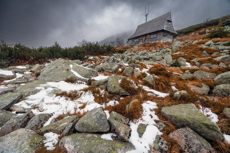 Beautiful mountain landscape with dramatic cloudy skyの写真素材