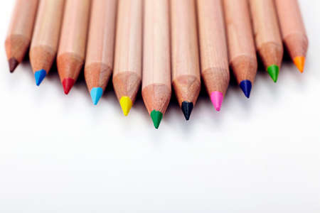 Closeup colored pencils on white background
