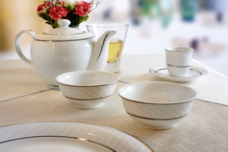 Ceramic tableware on the tableの写真素材