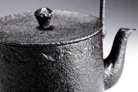 Iron teapot on white background, closeupの写真素材