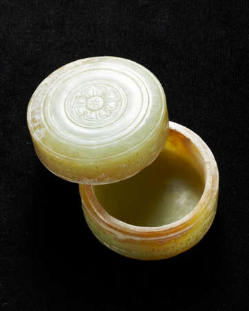 Chinese cultural relics, jade on black backgroundの写真素材