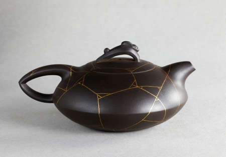 Chinese Yixing clay teapot on white backgroundの写真素材