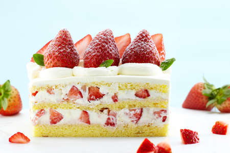 Fresh delicious strawberry cake on white backgroundの写真素材