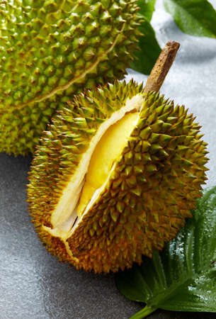 Close up of peeled durian on the stone background