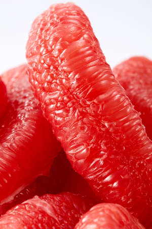 Fresh halves grapefruit isolated on white backgroundの写真素材