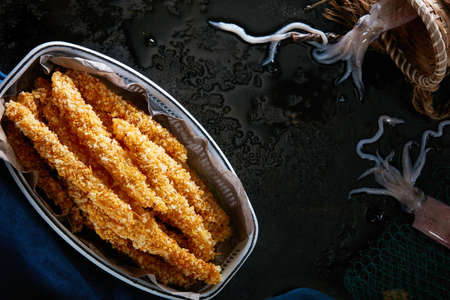 Delicious fried food, fried squid whiskers.の写真素材