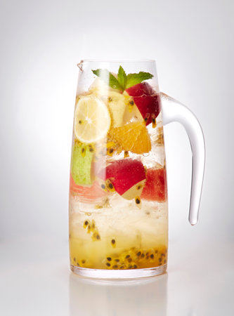 Fruit lemonade with kiwi, orange, lime and mintの写真素材
