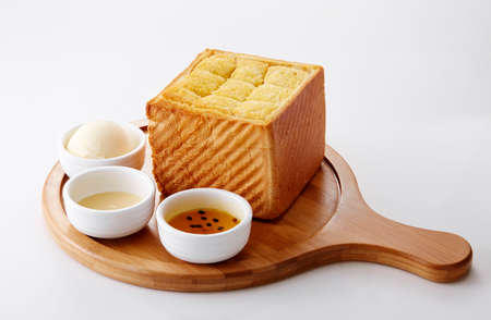 Bread with honey and ice cream on a white background, isolate