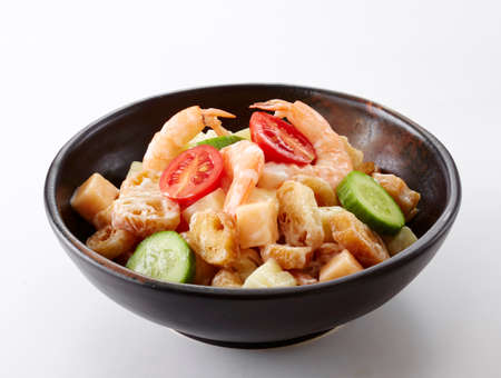 simmered chicken with vegetables and sesame seedsの写真素材