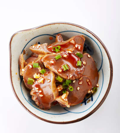 Chinese food, simmered pork in soy sauce on white background