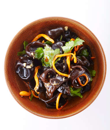 black mushroom in soy sauce on white backgroundの写真素材