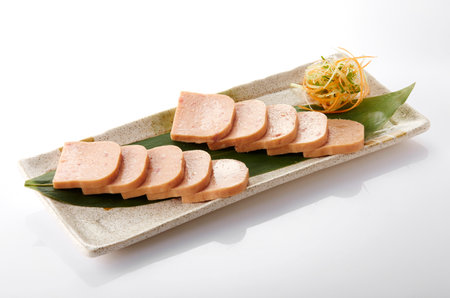 Sliced boiled pork meat on a white background. Japanese food