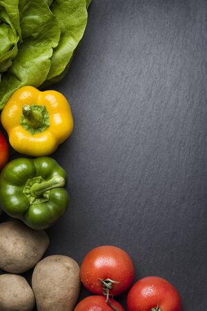 Arrangement with colorful mixed vegetables and blank copyspace.の写真素材