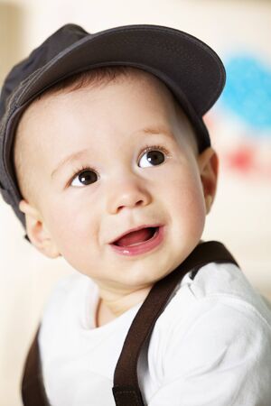 Baby boy portrait with cap.の写真素材