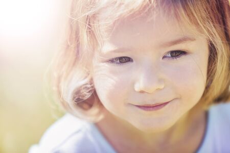 Portrait of angelic blond girlの写真素材