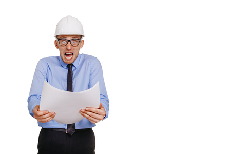 Architect engineer is horrified by the blueprint. Emotion concept. Isolated on white.の写真素材