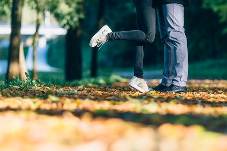 Couple Man and Woman Feet in Love. Happy young family concept. Lifestyle with nature on background.の写真素材