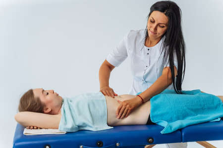Adult woman in spa salon having body relaxing massage. Health, beauty, resort and relaxation concept.の写真素材