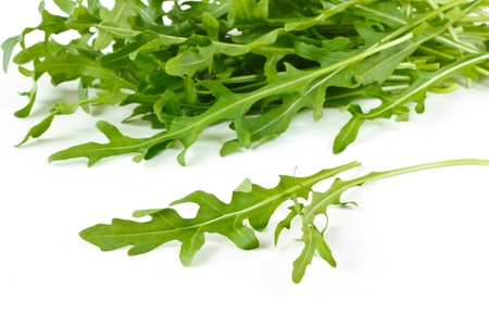 Fresh green rucola leaves on white background.の写真素材