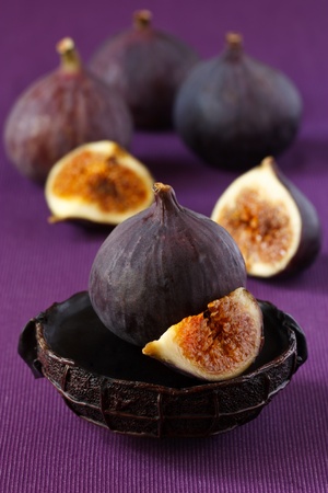 Delicious ripe figs on the purple fabric.の写真素材