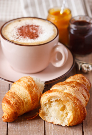 Fresh croissant and cup of coffee for breakfast.の写真素材