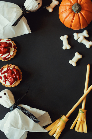 Happy Halloween frame with candy and cookies.の写真素材