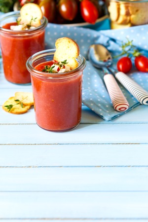 Tasty no-cook soup gaspacho and fresh ingredients.の写真素材