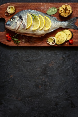 Tasty healthy fish with vegetables and spices.の写真素材