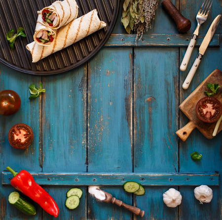 Homemade healthy wraps for lunch or picnic with place for text or menuの写真素材